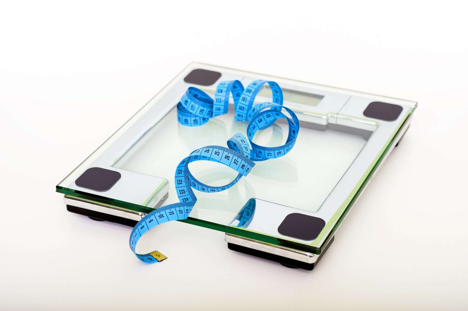 a measuring tape on a scale
