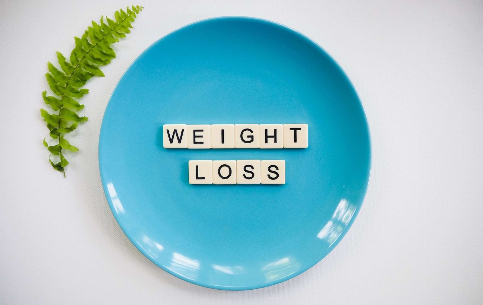 a blue plate with letters on it